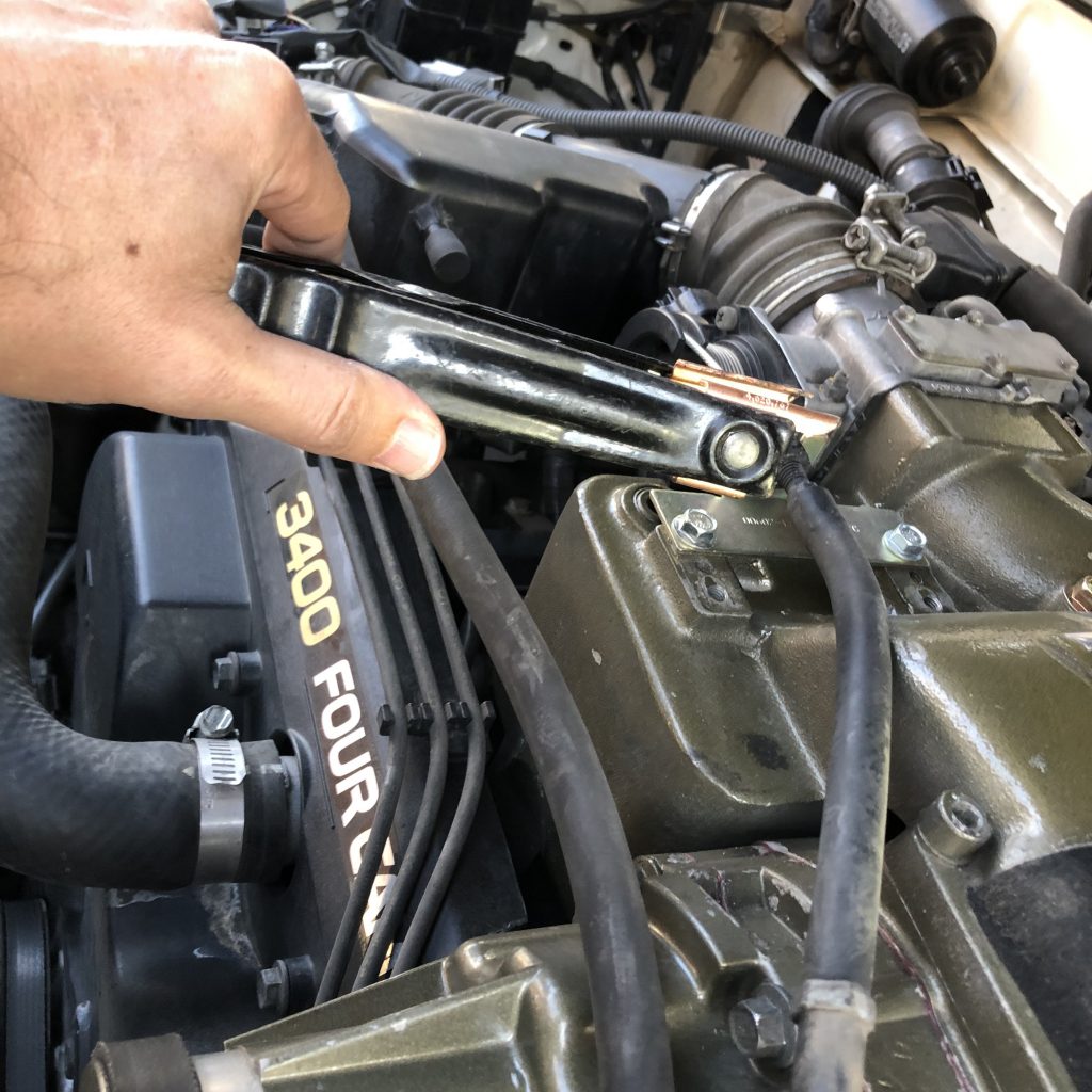 Attaching negative to engine ground on dead vehicle for safety